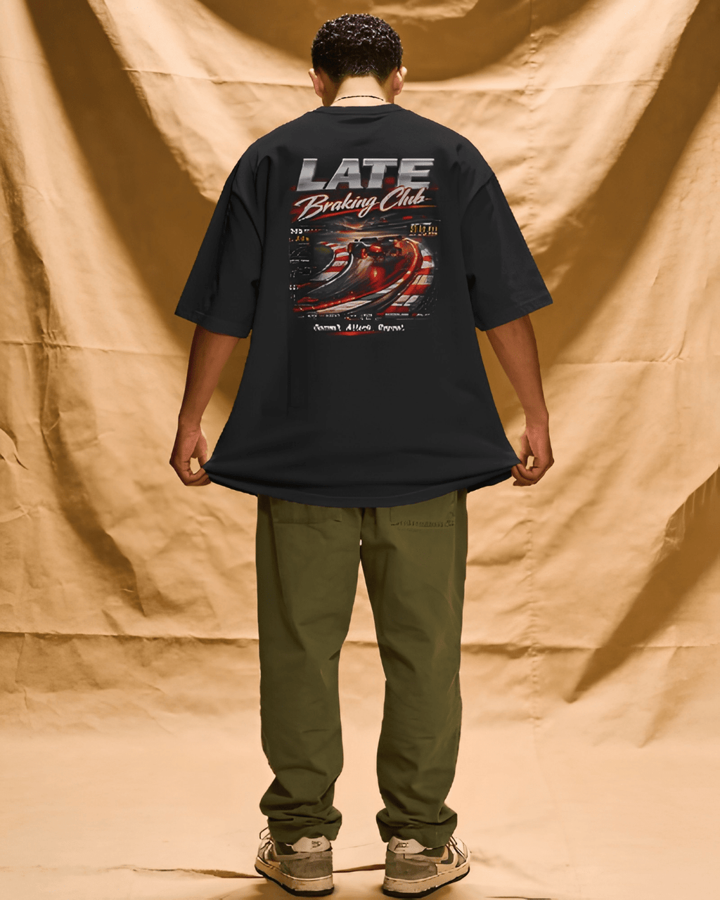 Late Braking Club oversized motorsport tee worn by model, back print, India